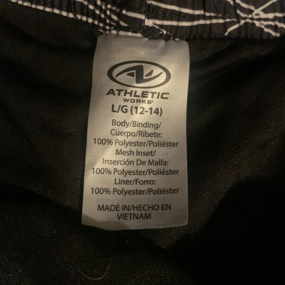 New athletic shorts, new, size L (12-14).